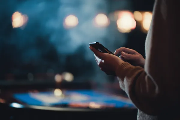 A glowing roulette wheel with cascading chips, symbolizing the engaging live and instant-win games available on JILI998.